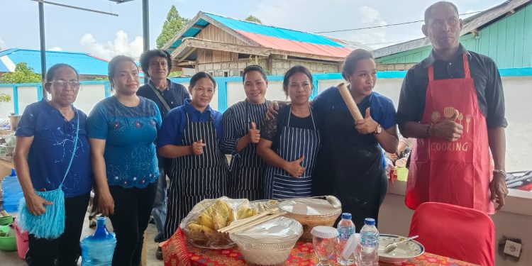Perwata GPI Petra Anday Lomba Masak dan Makan Papeda