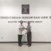 Kadiv Yankum Menyerahkan Surat Pencatatan Hak Cipta