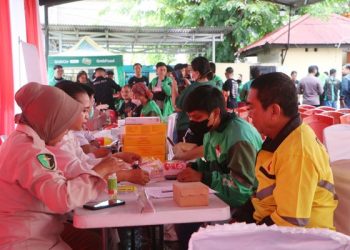 Pengemudi Ojol Senang, Dapat Pelayanan Kesehatan Gratis Hari Bhayangkara ke-79 Polda Sulut