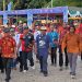 Diguyur Hujan, Bupati Mansel dan Wabup Teluk Wondama Tetap Ikuti Arak-arakan Alkitab Tua