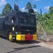 Respon Cepat, AWC Polres Teluk Bintuni Padamkan Kebakaran Lahan di Jalan Poros Tuasai