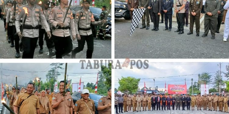 Pimpin Taptu dan Pawai Obor, Bupati Yohanis: Jaga Api Perjuangan Tetap Menyala dan Tak Padam