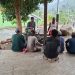 Canda Tawa Satgas TMMD dengan Warga Kampung Yamboi, Wujud Persaudaraan